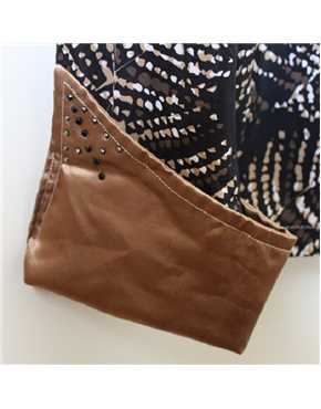 shirt black lycra with gold brown and white pattern cuff detail